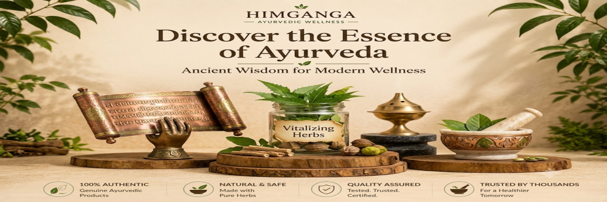 A promotional banner for HIMGANGA Ayurvedic Wellness featuring the text 'Discover the Essence of Ayurveda'. The scene is styled with natural elements including a brass scroll on a stand, a jar of 'Vitalizing Herbs', a brass incense burner, and a stone mortar and pestle with green leaves, all arranged on wooden trays against a warm beige background with hanging green leaves.